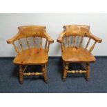 A pair of pine armchairs