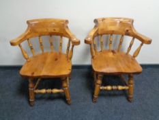 A pair of pine armchairs