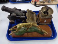A tray of brass figure, coffee grinder,