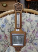 An Edwardian walnut barometer