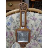 An Edwardian walnut barometer