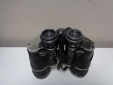 A pair of vintage Carl Zeiss binoculars 10 x 50 CONDITION REPORT: Lens fog and haze,