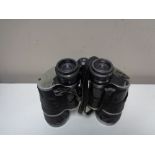 A pair of vintage Carl Zeiss binoculars 10 x 50 CONDITION REPORT: Lens fog and haze,