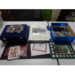 A quantity of collector's coins, plastic coin wallets,