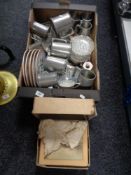 A box of pewter, stainless ware, tankards, place mats,