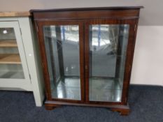 A reproduction mahogany bookcase