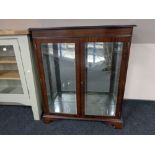 A reproduction mahogany bookcase