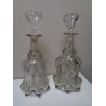 A pair of Georgian glass mallet shaped decanters