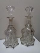 A pair of Georgian glass mallet shaped decanters