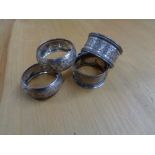 Four silver napkin rings