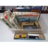 A box of model making kits, military vehicles,