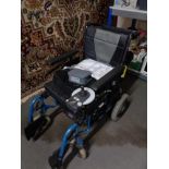 An Alber electric wheel chair, complete with operating manual, charger, etc.