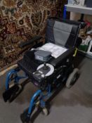 An Alber electric wheel chair, complete with operating manual, charger, etc.