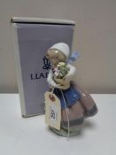 A Lladro figure - Spring is here, 05223, boxed.