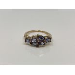 A 9ct gold tanzanite and diamond ring, size N CONDITION REPORT: 2.