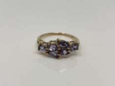 A 9ct gold tanzanite and diamond ring, size N CONDITION REPORT: 2.