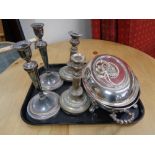 A tray of antique pewter and silver plated candlesticks,