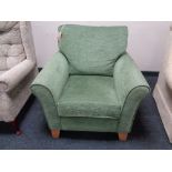 A contemporary green armchair