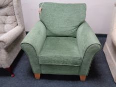 A contemporary green armchair