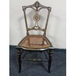 A Victorian mother of pearl inlaid lacquered bedroom chair