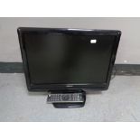 A Toshiba 19 inch lcd tv with remote