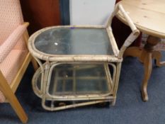 A bamboo glass topped conservatory trolley