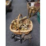 A wicker crate of brass, cast Scotty dog figures,