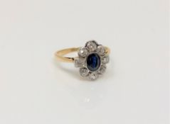 An antique gold sapphire and diamond cluster ring, size J CONDITION REPORT: 2.