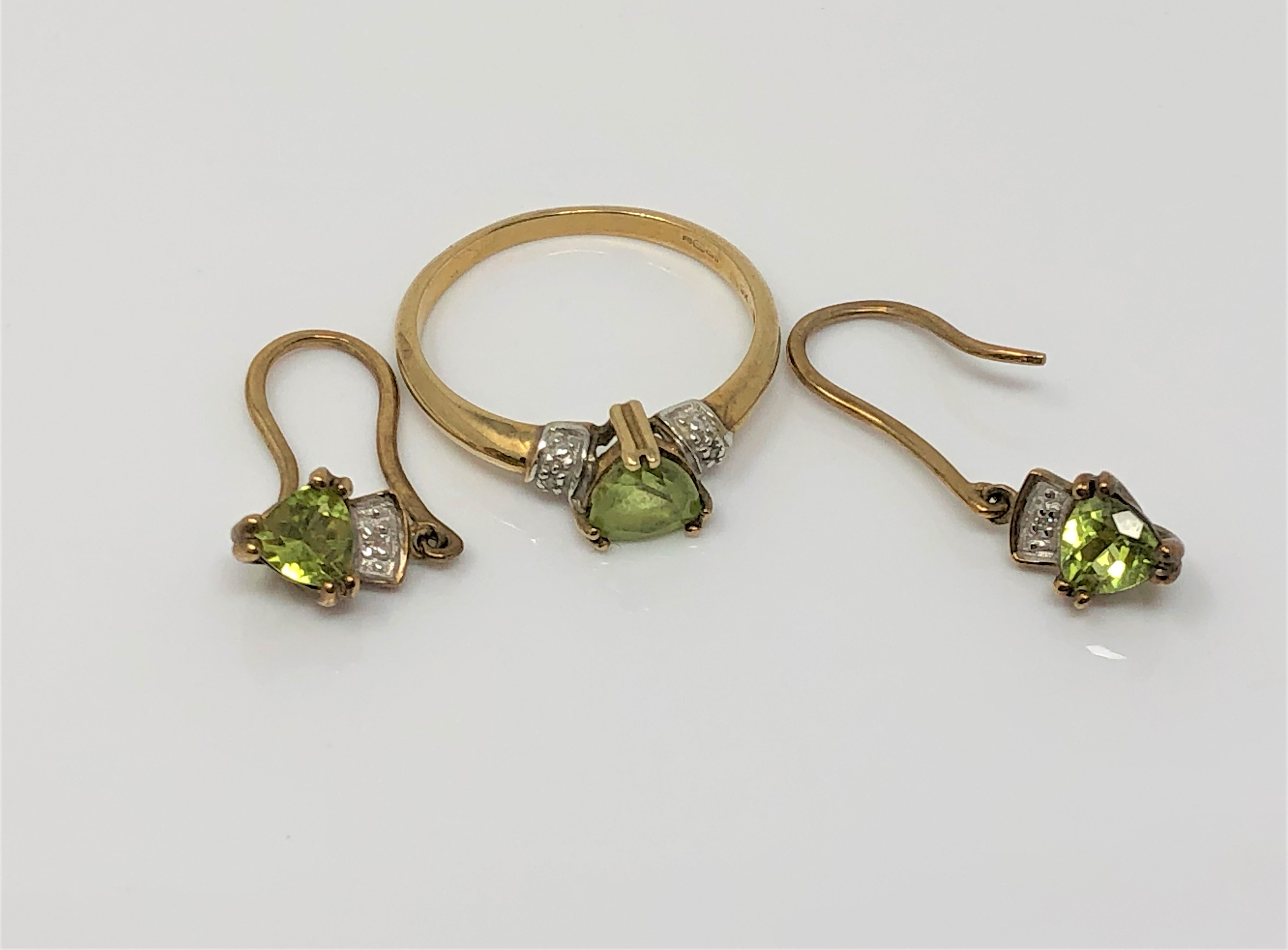 A 9ct gold peridot and diamond ring,