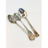 Three good quality enamelled silver spoons