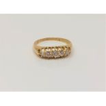 An antique 18ct gold five stone diamond ring, Q CONDITION REPORT: 4.