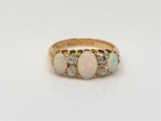 A fine antique 18ct gold opal and diamond ring,