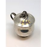 A large late eighteenth century silver mustard pot, indistinct marks, height 8.