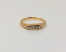 A gold five stone diamond ring, size G CONDITION REPORT: 2.7g. Marked rubbed.