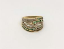 A 9ct gold emerald and diamond set ring, size P CONDITION REPORT: 4.