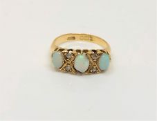 An antique 18ct gold opal and diamond ring,
