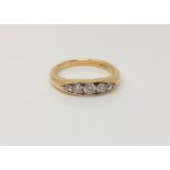 An 18ct gold five stone diamond ring, size I CONDITION REPORT: 3.