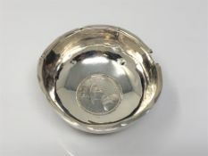 A Georgian small silver bowl inset with a medal for Christ's Hospital by L.