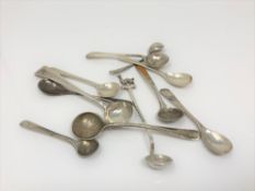 Eleven silver salt and mustard spoons