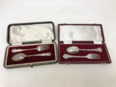 Two boxed silver fork and spoon sets