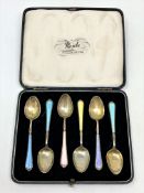 A set of six enamelled silver spoons