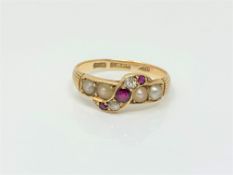 An antique 18ct gold pearl, ruby and diamond ring, size L CONDITION REPORT: 2.