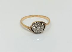 An antique gold diamond cluster ring, size N CONDITION REPORT: Marks rubbed. 1.