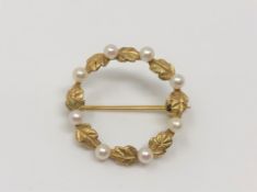 A 9ct gold pearl set brooch CONDITION REPORT: 3.