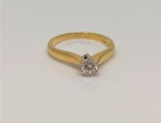 An 18ct gold solitaire diamond ring, approx. 0.2 carat, size N CONDITION REPORT: 3.