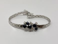 An 18ct white gold sapphire and diamond bracelet, approximately 1ct of diamonds, length 17.5cm.