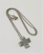 An 18ct white gold diamond set cross pendant on chain CONDITION REPORT: 4.