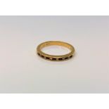 An 18ct gold sapphire and diamond half eternity ring, size N CONDITION REPORT: 2.
