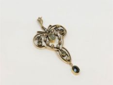 An antique 15ct gold tourmaline and pearl pendant