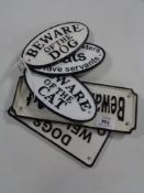 Five cast iron cat and dog signs
